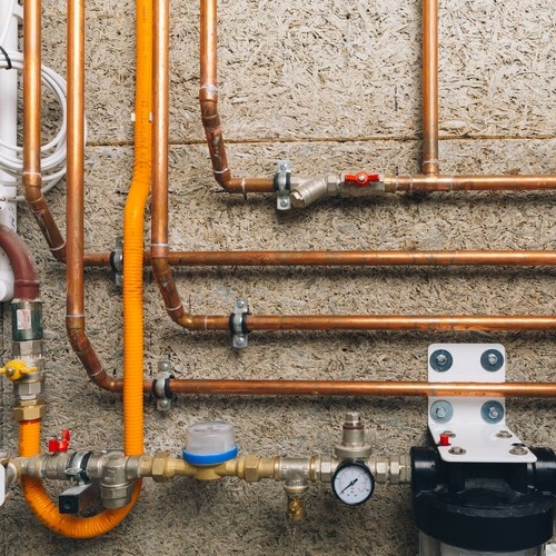 copper pipes in a boiler room