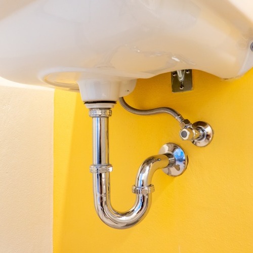 drain pipe under a sink