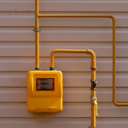 yellow gas meter and gas lines