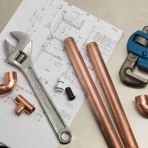 plumbing tools and materials with house plans