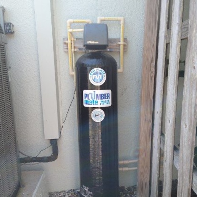 Whole house water filtration system