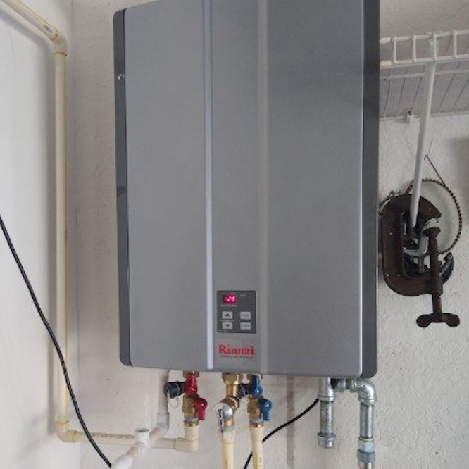 A brand-new tankless water heater installation.